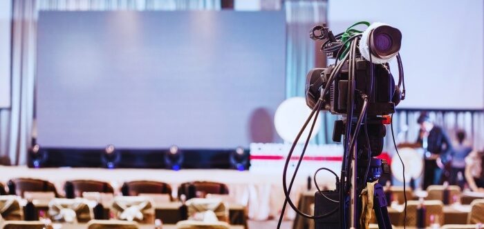 What Is the Importance of Capturing Photographs at a Conference?